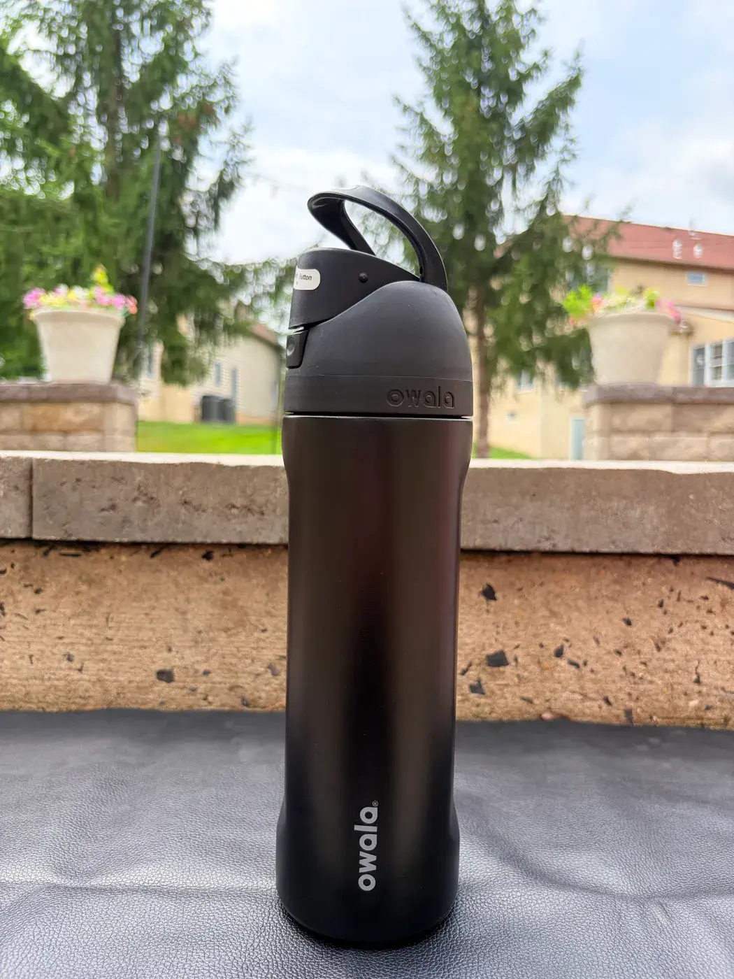 Owala 24oz FreeSip in Very Very Dark, ready for laser engraving